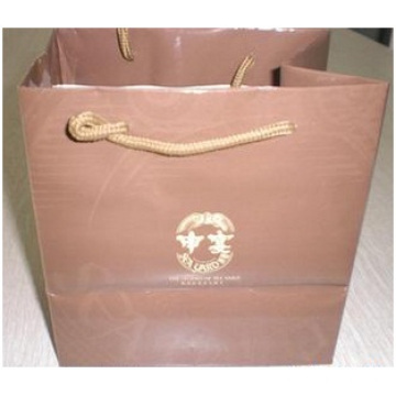 Bolsa de papel promocional para prendas de vestir. Bolsa de papel rosa personalizada